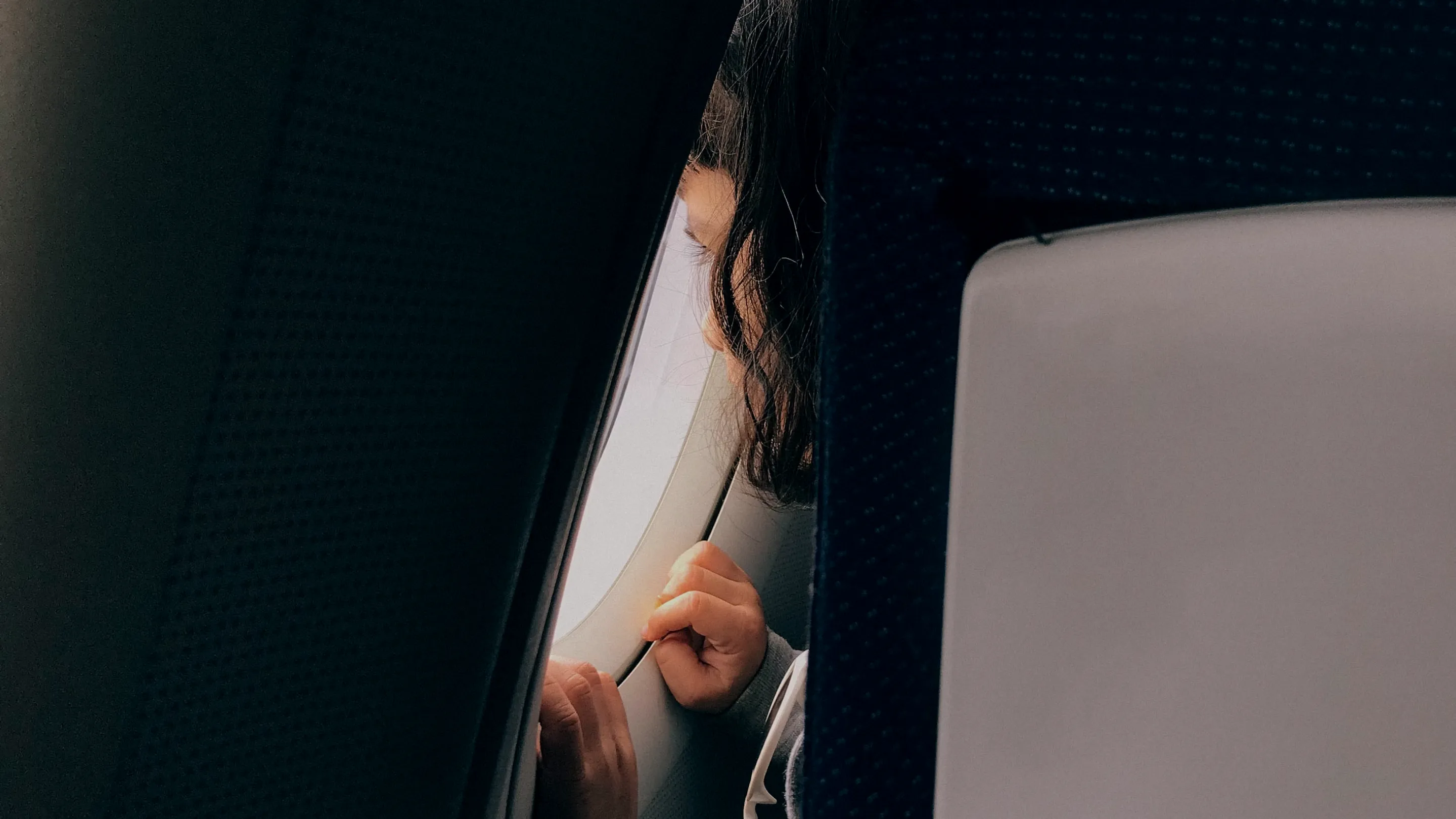 Person looking out a vehicle window